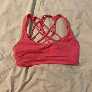 Coral strappy sports bra